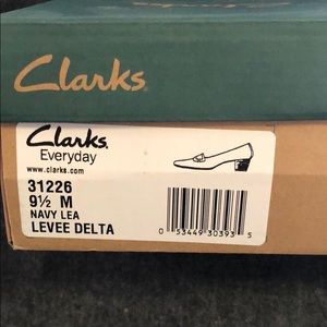 Clark’s Levee Delta pumps size 9 1/2.  Navy
